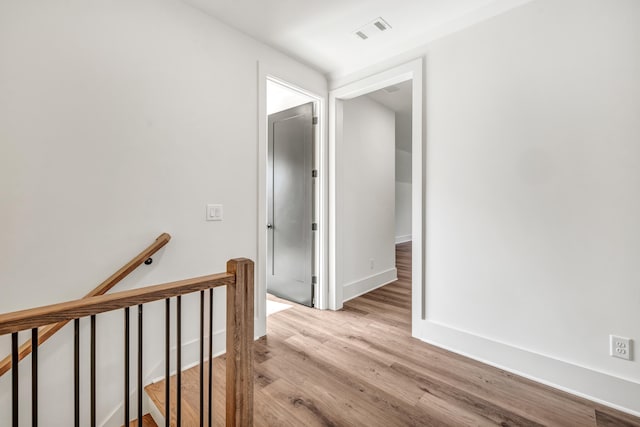 hallway featuring light wood-type flooring