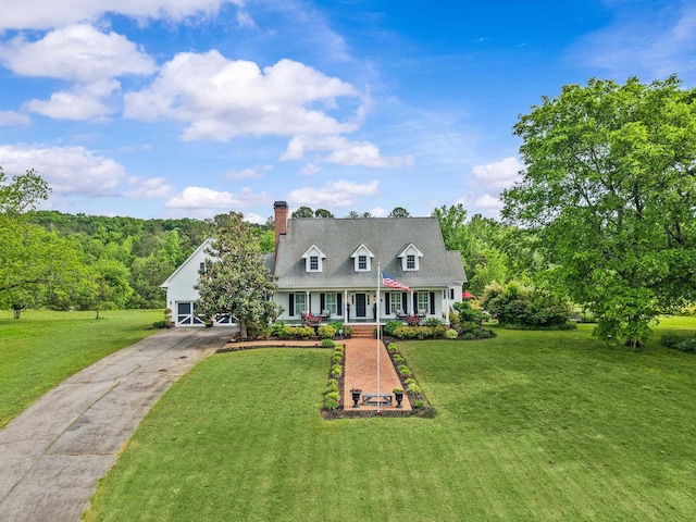 1290 Reid Duvall Rd, Madison, GA 30650 - cape cod home with a porch, a chimney, a front lawn, driveway, and a garage