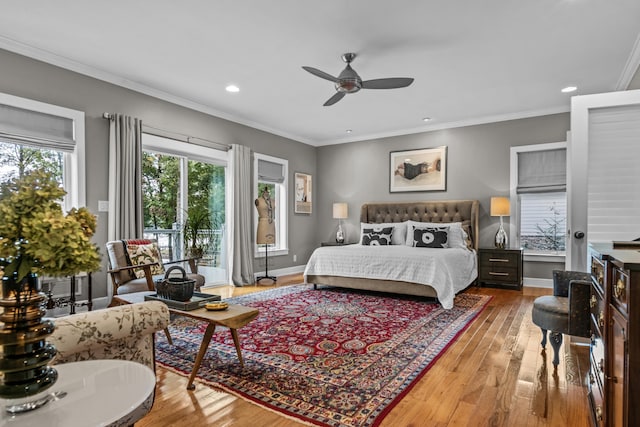 bedroom with crown molding, ceiling fan, hardwood / wood-style floors, and access to outside