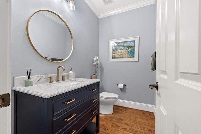 1191 Linger Longer Dr, Greensboro, GA 30642 - bathroom featuring ornamental molding, vanity, and wood finished floors
