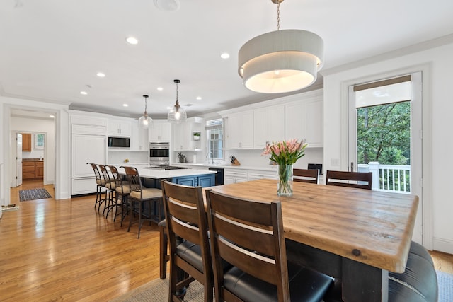 1191 Linger Longer Dr, Greensboro, GA 30642 - dining area with light wood-type flooring and recessed lighting