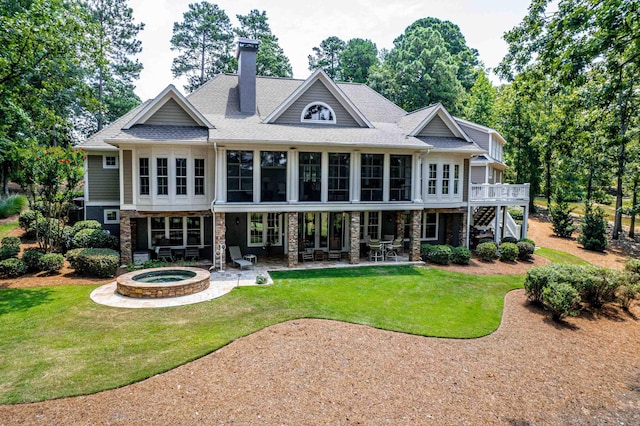 1191 Linger Longer Dr, Greensboro, GA 30642 - back of house with a lawn, a chimney, a patio area, stairs, and stone siding
