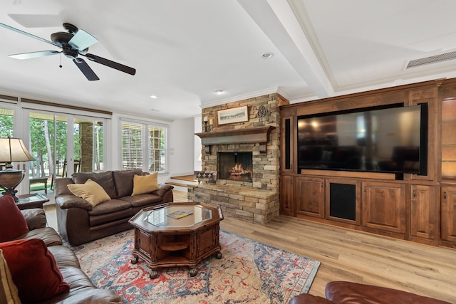 1191 Linger Longer Dr, Greensboro, GA 30642 - living area featuring light wood-type flooring, a ceiling fan, a fireplace, crown molding, and recessed lighting