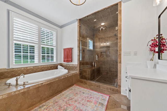 1191 Linger Longer Dr, Greensboro, GA 30642 - full bathroom with a garden tub, vanity, a stall shower, crown molding, and tile patterned floors