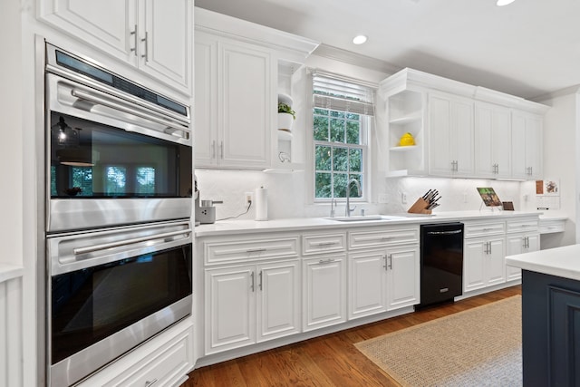 1191 Linger Longer Dr, Greensboro, GA 30642 - kitchen featuring open shelves, dishwasher, stainless steel double oven, white cabinets, and recessed lighting