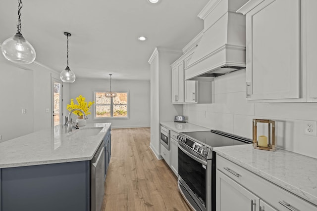 kitchen with custom range hood, stainless steel electric stove, a sink, and ornamental molding