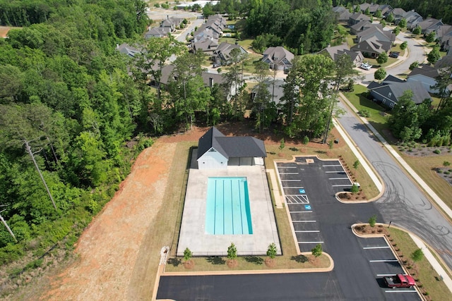 birds eye view of property with a residential view