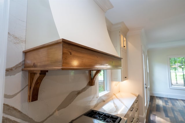 kitchen featuring white cabinetry and plenty of natural light