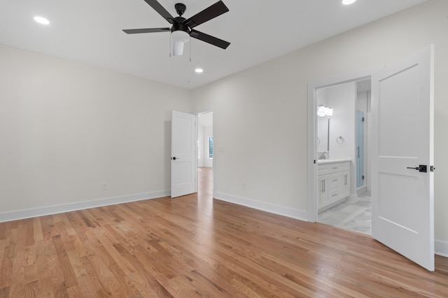 631 Susan Davis Rd, Sparta, GA 31087 - unfurnished bedroom featuring light wood-style floors, recessed lighting, baseboards, ensuite bathroom, and ceiling fan