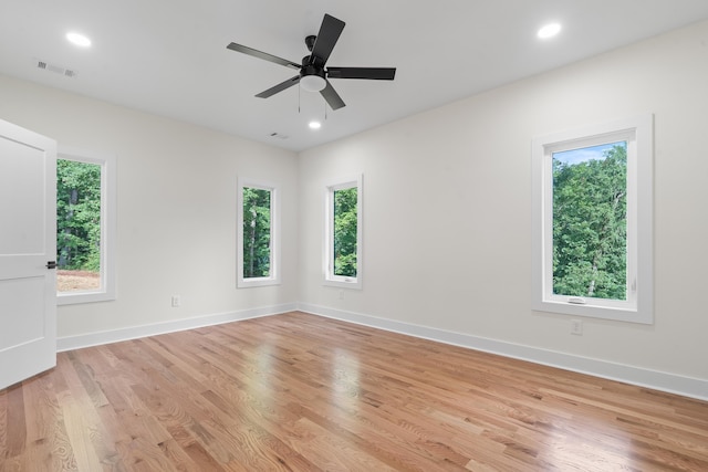 631 Susan Davis Rd, Sparta, GA 31087 - empty room featuring healthy amount of natural light, light wood finished floors, and recessed lighting