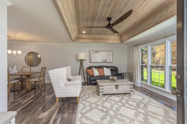 living room with crown molding, wood ceiling, hardwood / wood-style floors, ceiling fan with notable chandelier, and a raised ceiling