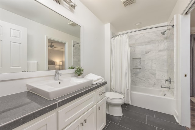 full bathroom featuring shower / tub combo, vanity, toilet, and tile patterned flooring