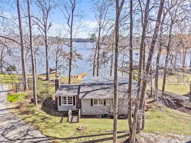 view of front of house featuring a water view and a front yard