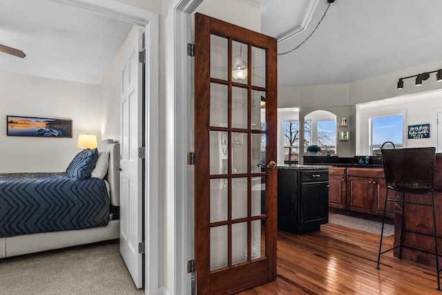 hallway featuring dark wood-style floors