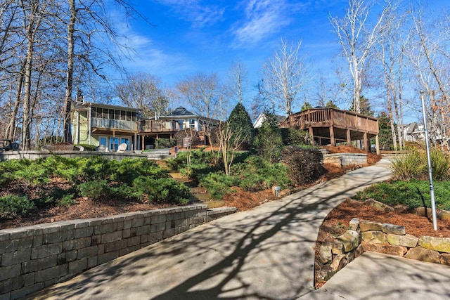 exterior space featuring a wooden deck