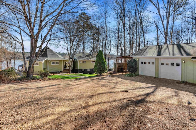 exterior space with driveway and a garage