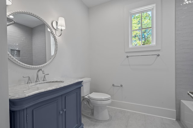 bathroom with a tub to relax in, toilet, vanity, baseboards, and a shower