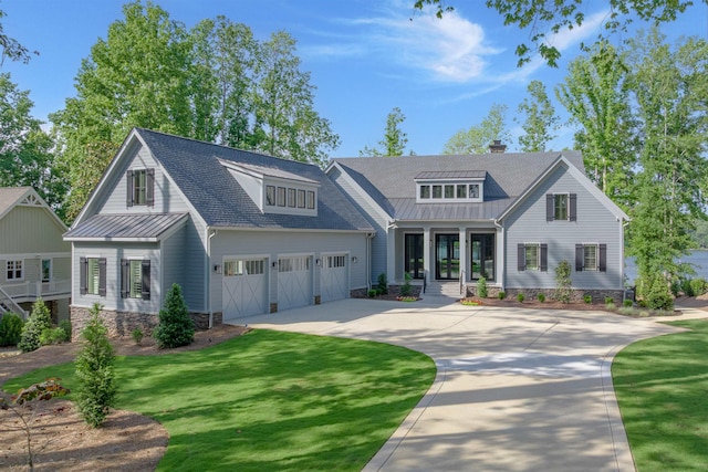 1300 Lake Club Dr, Greensboro, GA 30642 - view of front of property featuring driveway, a standing seam roof, and metal roof