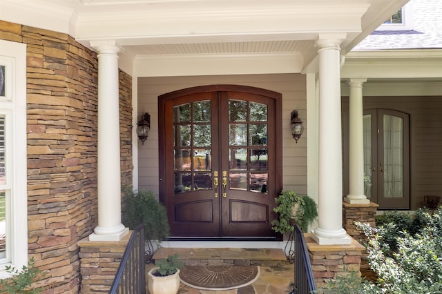1320 Dejarnet Pl, Greensboro, GA 30642 - entrance to property featuring french doors, a porch, and stone siding