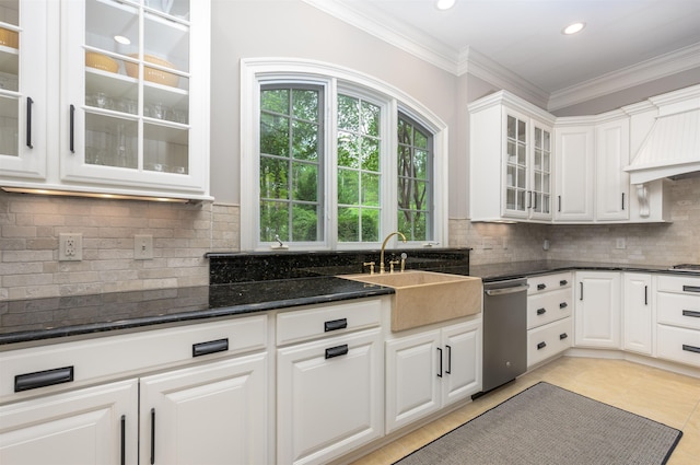 1320 Dejarnet Pl, Greensboro, GA 30642 - kitchen with dishwasher, white cabinets, dark stone counters, recessed lighting, and ornamental molding