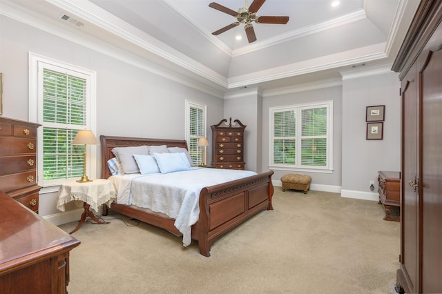 1320 Dejarnet Pl, Greensboro, GA 30642 - bedroom with light colored carpet, crown molding, a tray ceiling, a ceiling fan, and recessed lighting