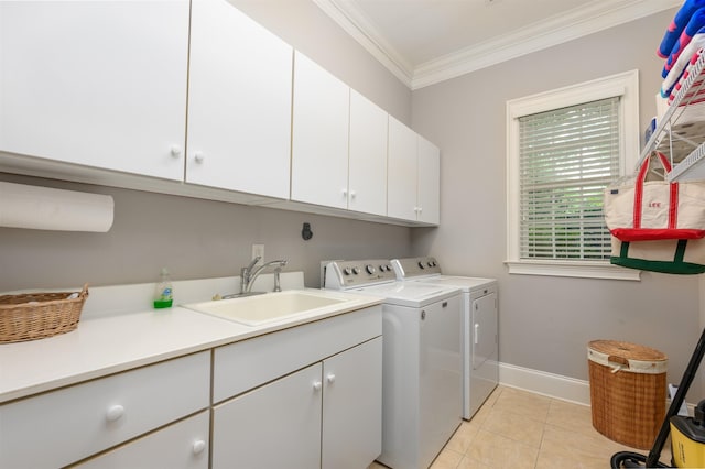 1320 Dejarnet Pl, Greensboro, GA 30642 - laundry room featuring cabinet space, crown molding, washing machine and clothes dryer, and light tile patterned flooring