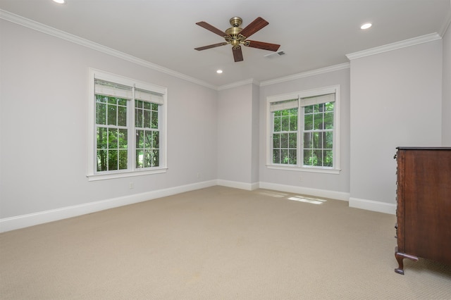 1320 Dejarnet Pl, Greensboro, GA 30642 - spare room featuring light carpet, a ceiling fan, recessed lighting, and crown molding