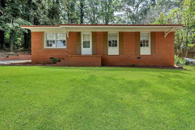 ranch-style house with a front yard