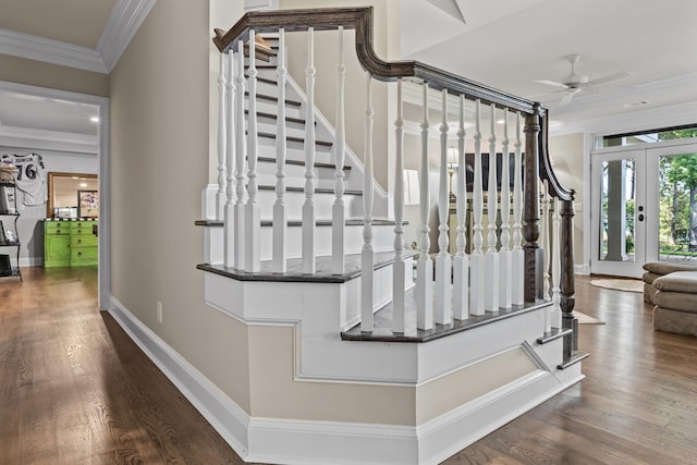 staircase featuring hardwood / wood-style flooring, ornamental molding, and french doors