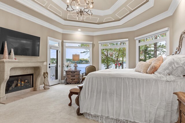 carpeted bedroom with a fireplace, crown molding, access to outside, and a chandelier