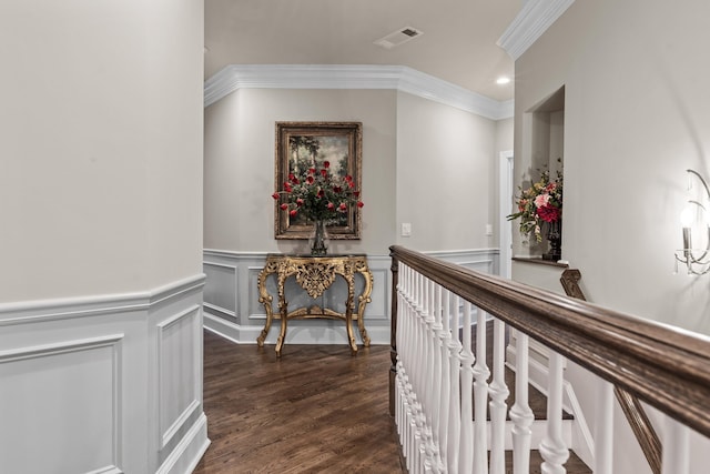 hall featuring crown molding and dark hardwood / wood-style floors