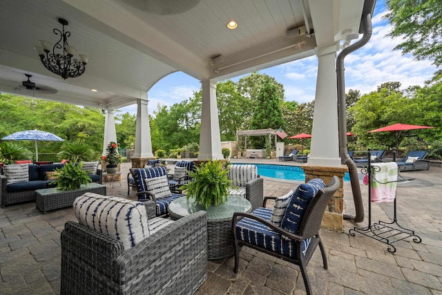 view of patio featuring an outdoor pool, outdoor lounge area, and outdoor dining area