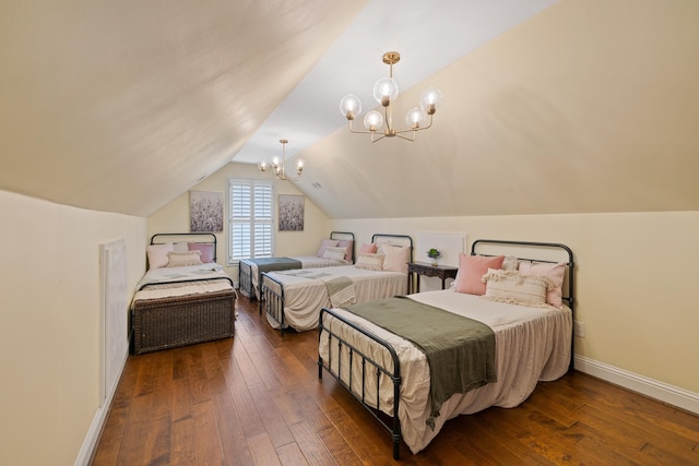 bedroom featuring baseboards, an inviting chandelier, lofted ceiling, and dark wood-type flooring