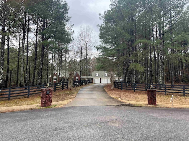 view of street featuring driveway