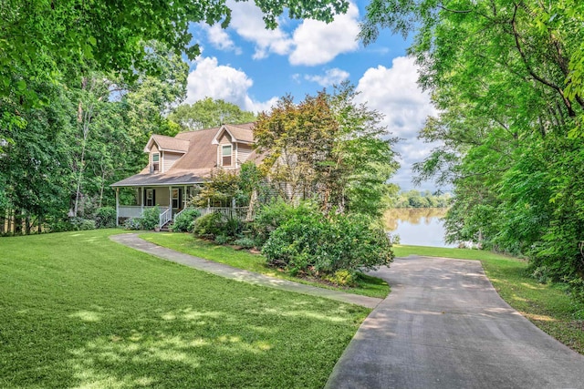 1601 Heidi Trl, Buckhead, GA 30625 - view of front of house with a porch, a front lawn, and a water view