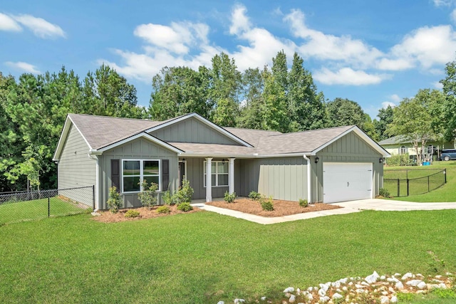 ranch-style house featuring a garage and a front lawn