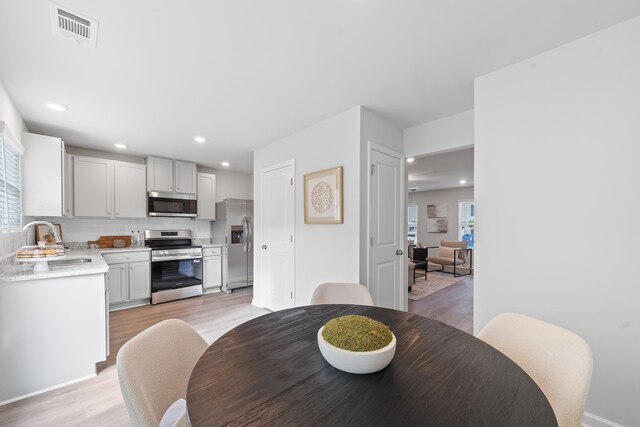 100 Lena Ln, Eatonton, GA 31024 - dining area with recessed lighting, visible vents, and light wood-style floors