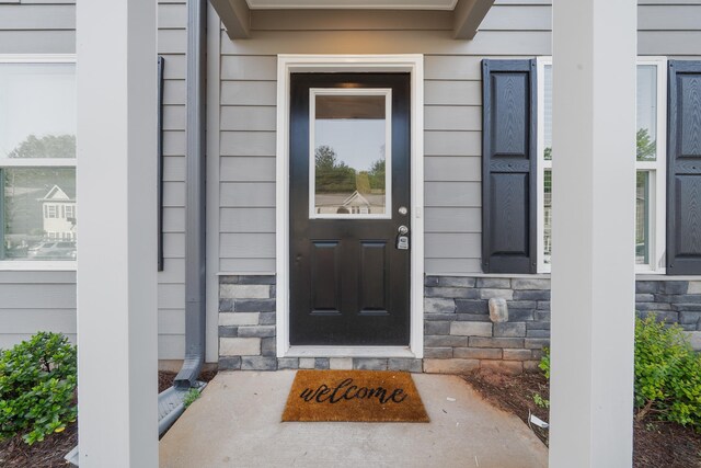 100 Lena Ln, Eatonton, GA 31024 - view of exterior entry with stone siding