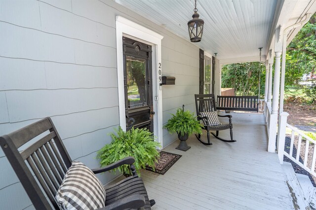 wooden deck with a porch