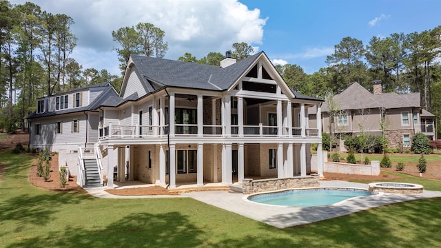 1111 Swift Crk, Greensboro, GA 30642 - rear view of house with a patio, a lawn, stairs, and a sunroom
