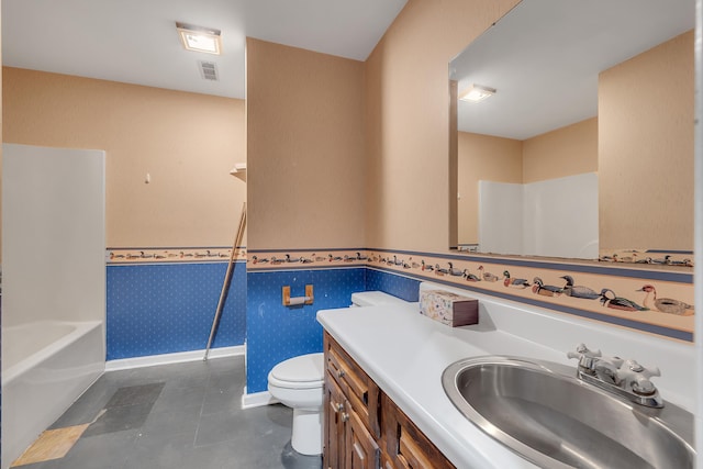 full bathroom with vanity, bathing tub / shower combination, and toilet