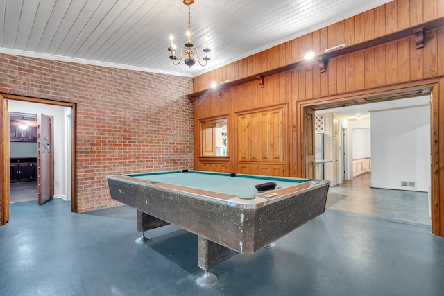 rec room featuring crown molding, billiards, and brick wall