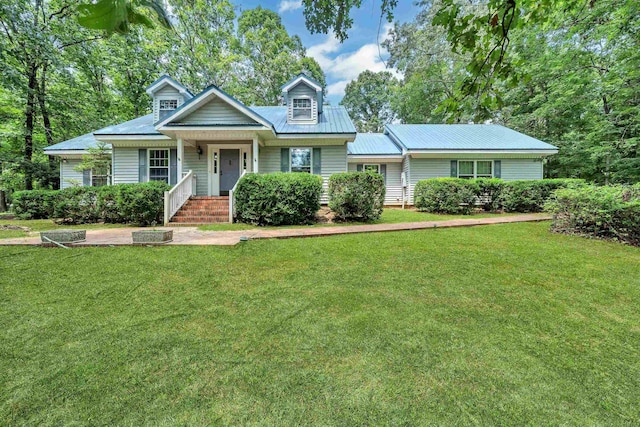 view of front of home with a front lawn