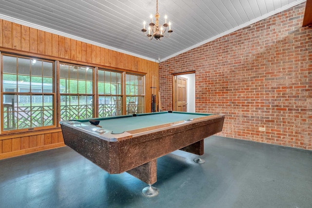 playroom featuring ornamental molding, brick wall, a wealth of natural light, and wood walls