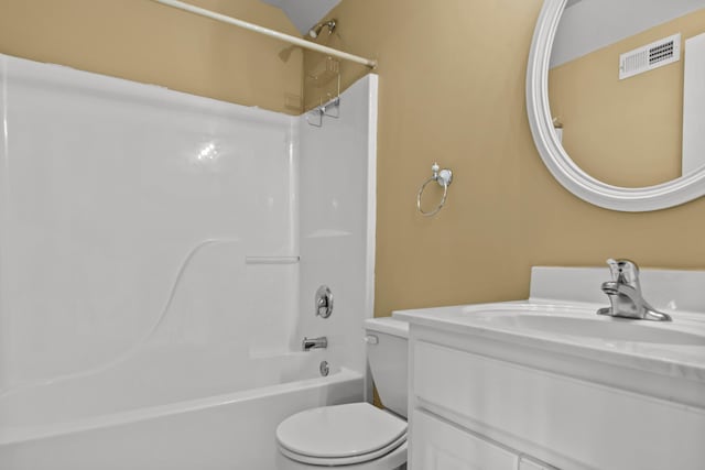 full bathroom featuring bathtub / shower combination, vanity, and toilet