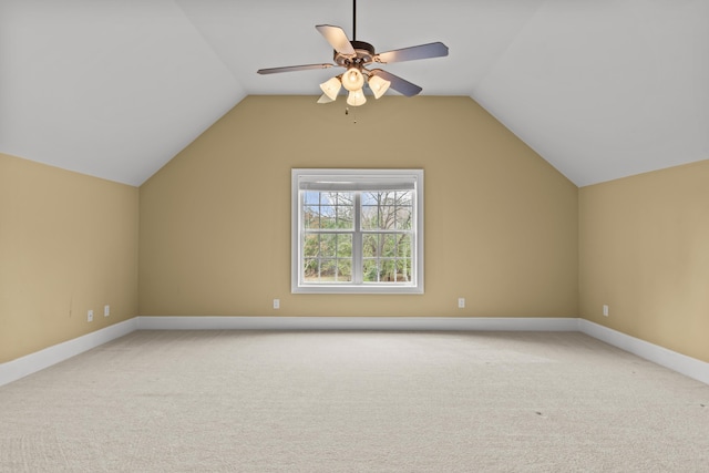 bonus room featuring ceiling fan, lofted ceiling, and carpet flooring