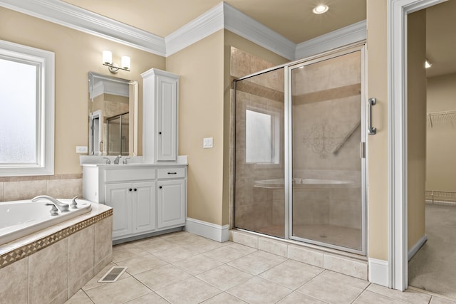 bathroom featuring crown molding, shower with separate bathtub, vanity, and tile patterned floors