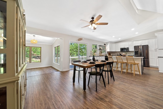 dining room featuring recessed lighting, vaulted ceiling, ceiling fan, and dark wood-style flooring