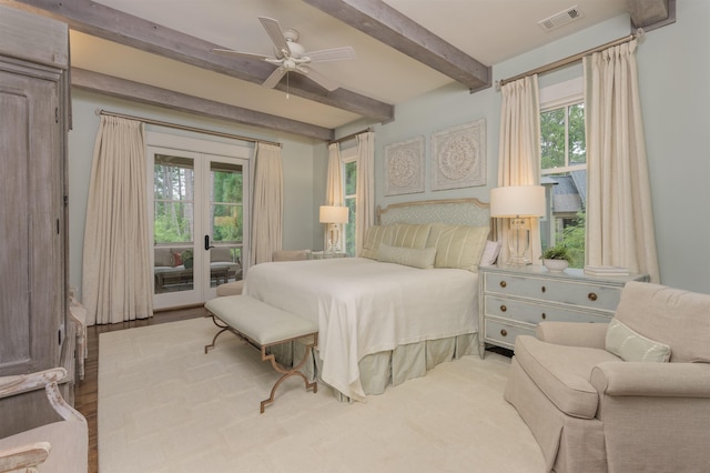 bedroom featuring access to exterior, french doors, beamed ceiling, and ceiling fan