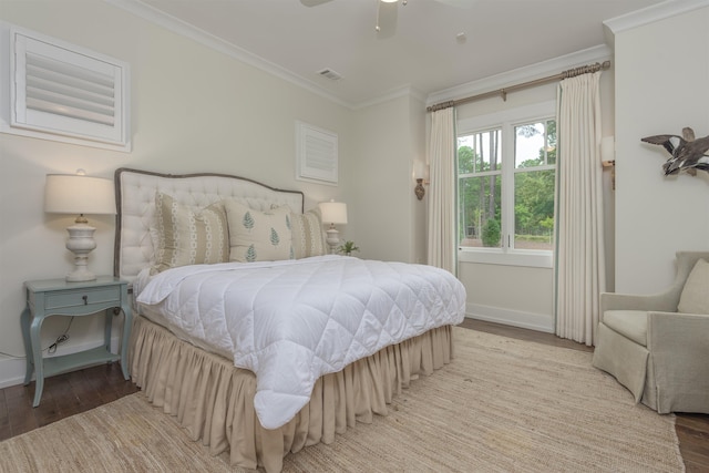 bedroom featuring ornamental molding, ceiling fan, and light hardwood / wood-style flooring